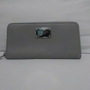 Gray/silver Michael Kors wallet.